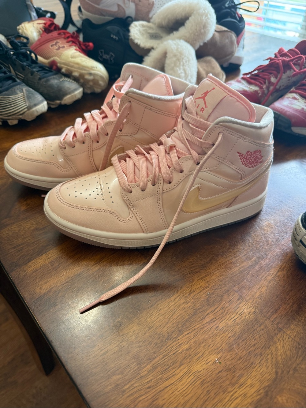 Jordan Women’s High-Top Sneakers in Pink and Gold
